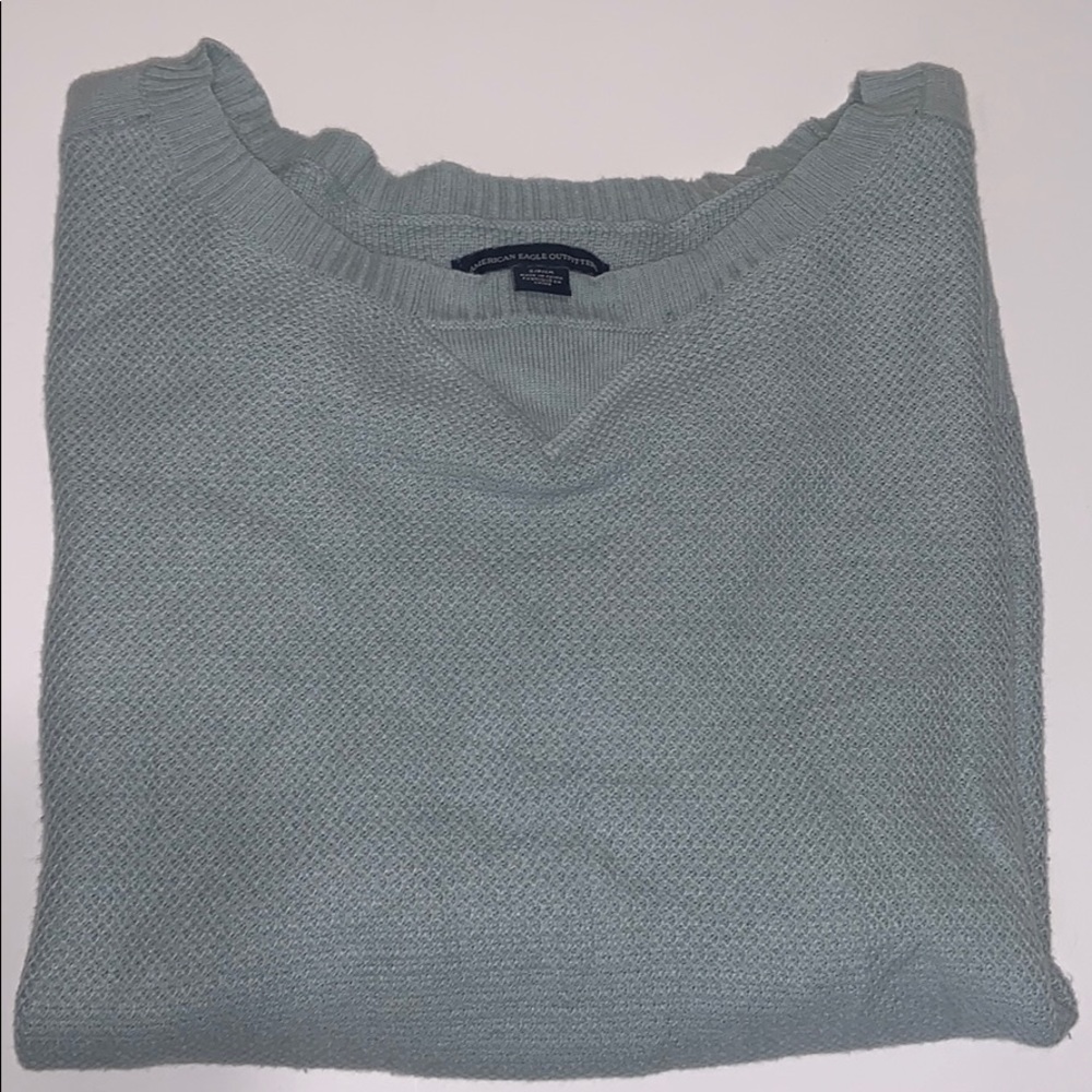 Small light teal American Eagler thin sweater